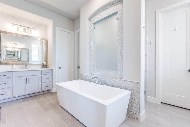 3525 Dancer Rd, Celina, TX 75009 - bathroom with a freestanding bath, vanity, and tile patterned floors