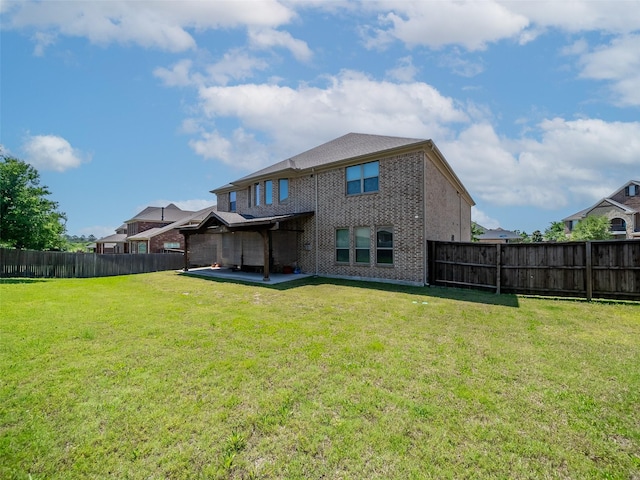 5207 Seth Ave, Sachse, TX 75048 - back of property with a patio and brick siding