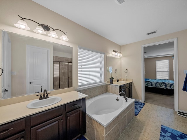 5207 Seth Ave, Sachse, TX 75048 - full bath featuring a garden tub, two vanities, a shower stall, and ensuite bathroom