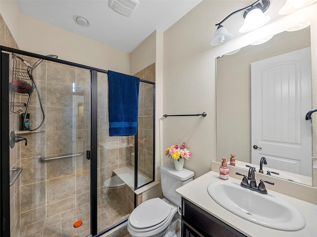 5207 Seth Ave, Sachse, TX 75048 - bathroom with vanity, toilet, and a stall shower