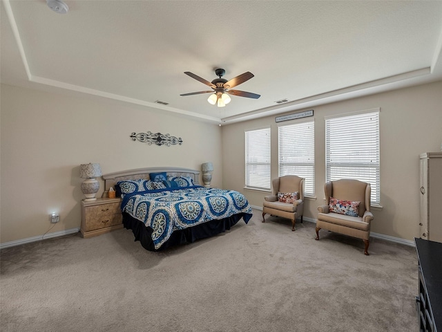 5207 Seth Ave, Sachse, TX 75048 - bedroom featuring carpet flooring, ceiling fan, baseboards, and a raised ceiling