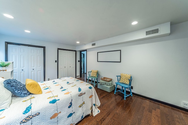 408 Davis St, Weatherford, TX 76086 - bedroom with two closets, dark wood finished floors, and recessed lighting