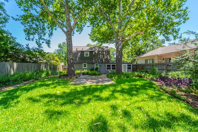 408 Davis St, Weatherford, TX 76086 - fenced backyard featuring a patio area
