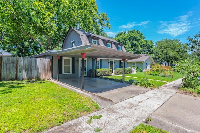 408 Davis St, Weatherford, TX 76086 - view of front of house featuring a gambrel roof, a carport, and driveway