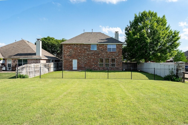 7807 Enchanted Isle Dr, Arlington, TX 76016 - rear view of property with brick siding and a chimney