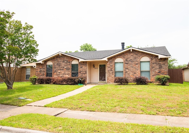 9001 Westfield Dr, Rowlett, TX 75088 - single story home with brick siding and a shingled roof