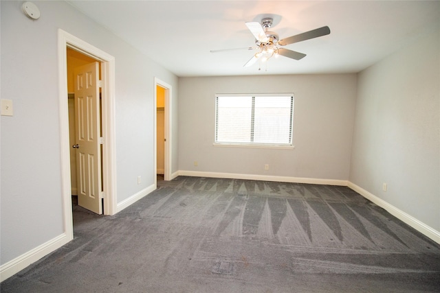 9001 Westfield Dr, Rowlett, TX 75088 - carpeted spare room with a smoke detector, a ceiling fan, and baseboards
