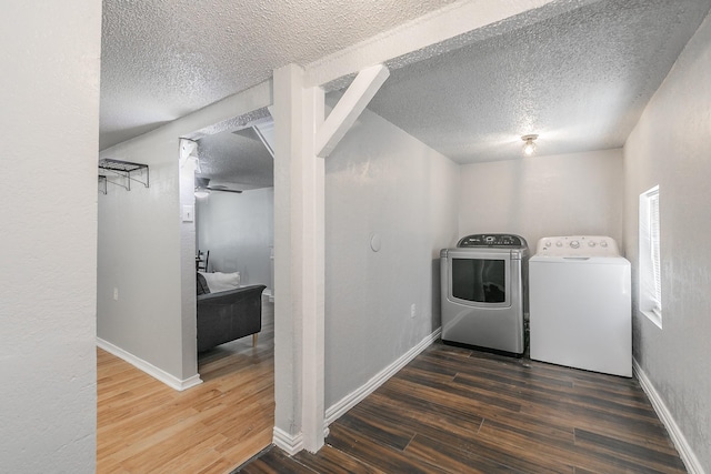 408 E Baylor St, Weatherford, TX 76086 - laundry area featuring washing machine and dryer, a textured ceiling, wood finished floors, and baseboards