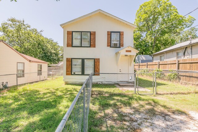 408 E Baylor St, Weatherford, TX 76086 - rear view of house featuring a gate and stucco siding
