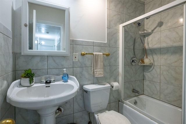 817 Edgehill Dr, Hurst, TX 76053 - bathroom with tub / shower combination, toilet, a sink, and tile walls