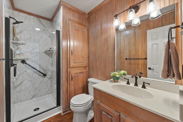 820 Windlake Cir, Heath, TX 75032 - full bathroom with crown molding, a marble finish shower, vanity, toilet, and wood finished floors