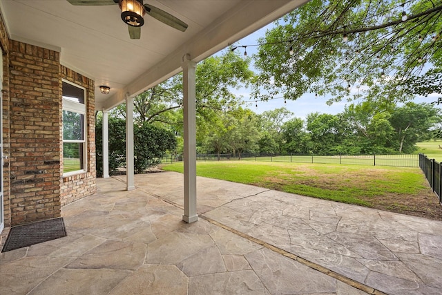 820 Windlake Cir, Heath, TX 75032 - view of patio / terrace featuring a ceiling fan and view of wooded area