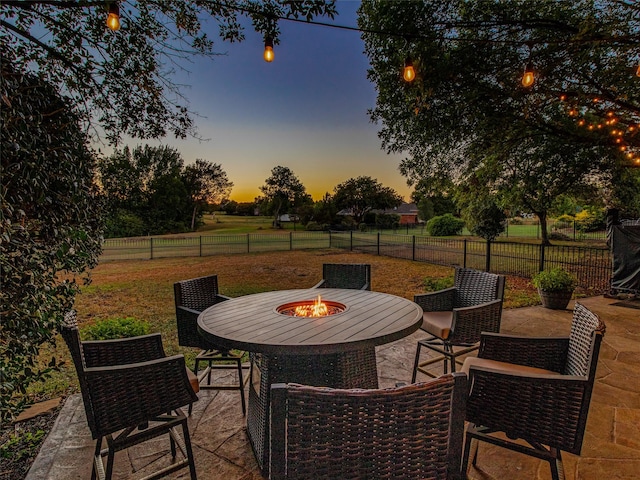 820 Windlake Cir, Heath, TX 75032 - fenced backyard with a patio area and an outdoor fire pit