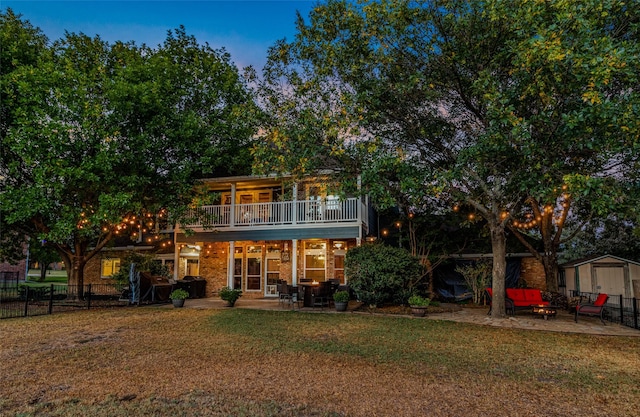 820 Windlake Cir, Heath, TX 75032 - rear view of property with a patio, outdoor lounge area, and a balcony