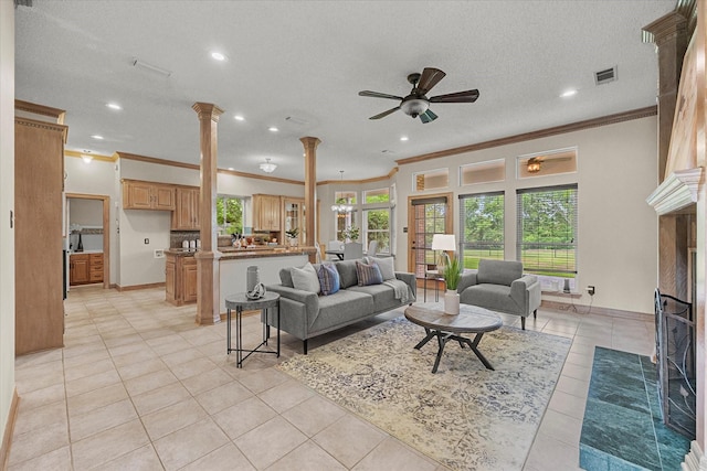 820 Windlake Cir, Heath, TX 75032 - living area featuring decorative columns, ornamental molding, recessed lighting, light tile patterned flooring, and ceiling fan