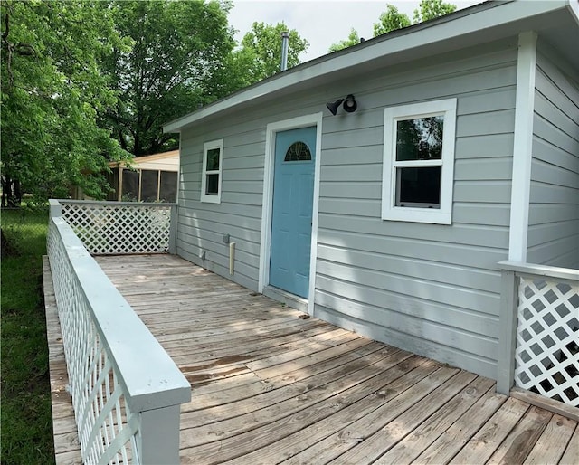 302 W Dexter St, Sherman, TX 75092 - wooden terrace featuring a sunroom
