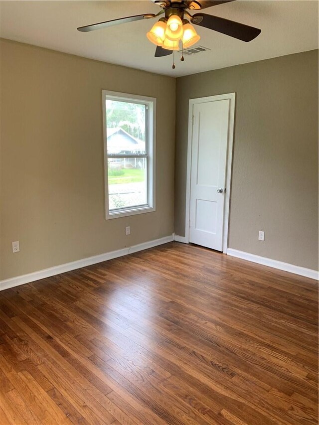 302 W Dexter St, Sherman, TX 75092 - spare room with ceiling fan and wood finished floors