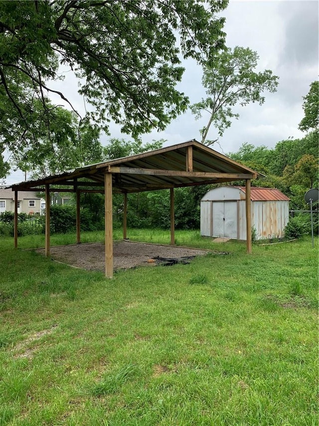 302 W Dexter St, Sherman, TX 75092 - view of grassy yard featuring a carport