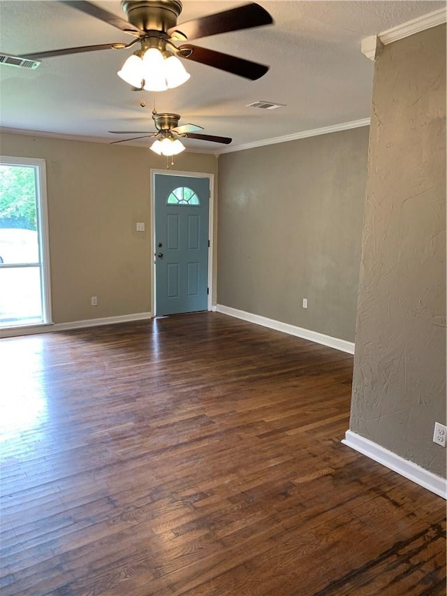 302 W Dexter St, Sherman, TX 75092 - entrance foyer with crown molding, a ceiling fan, dark wood-type flooring, and baseboards