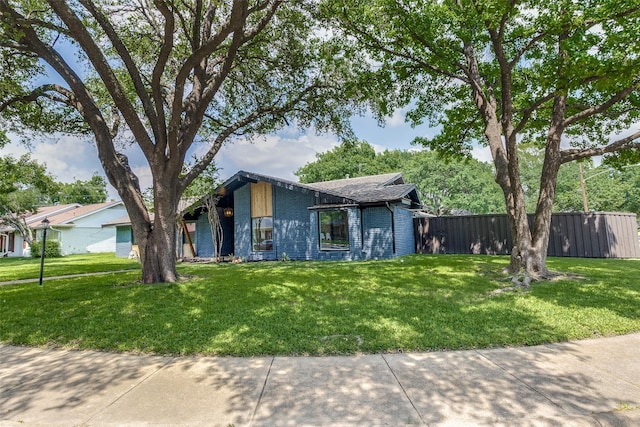 10240 Carry Back Cir, Dallas, TX 75229 - mid-century home with brick siding