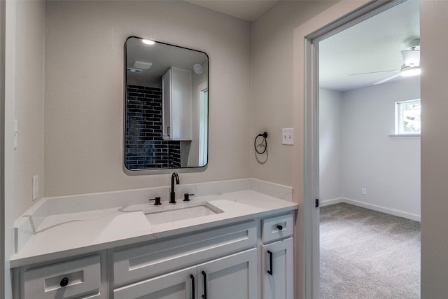10240 Carry Back Cir, Dallas, TX 75229 - bathroom featuring vanity, a ceiling fan, and baseboards