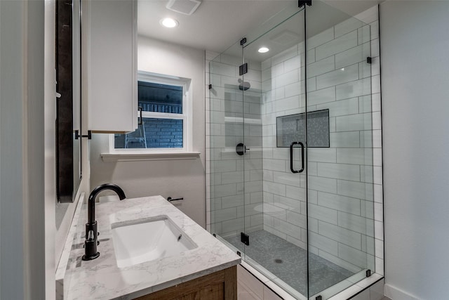 10240 Carry Back Cir, Dallas, TX 75229 - bathroom with a stall shower and double vanity