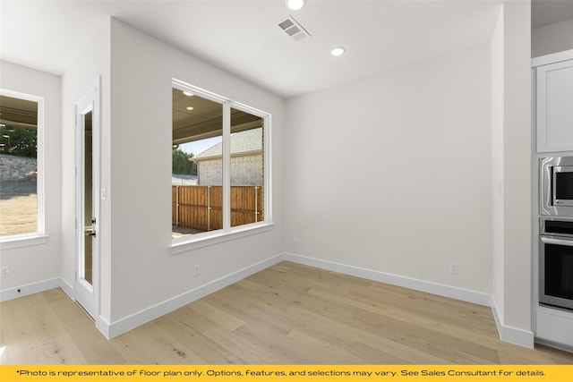802 Marathon Ct, Rockwall, TX 75087 - empty room featuring light wood finished floors, recessed lighting, and baseboards