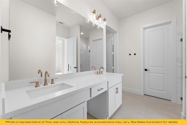 802 Marathon Ct, Rockwall, TX 75087 - bathroom with double vanity, a shower, tile patterned floors, and baseboards