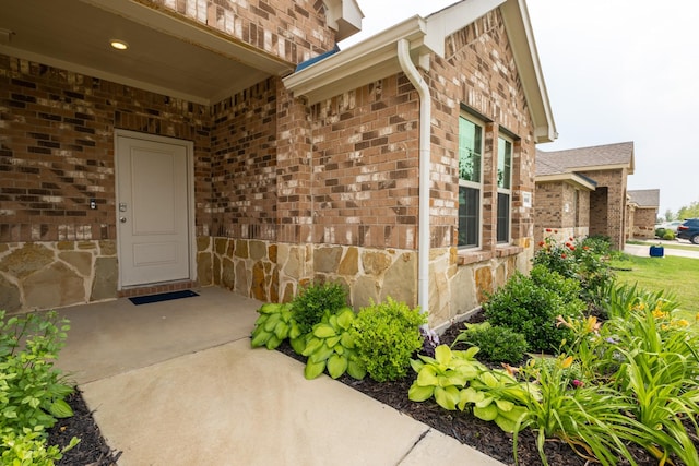 1003 Dewy Glen Ln, Princeton, TX 75407 - doorway to property featuring brick siding and stone siding