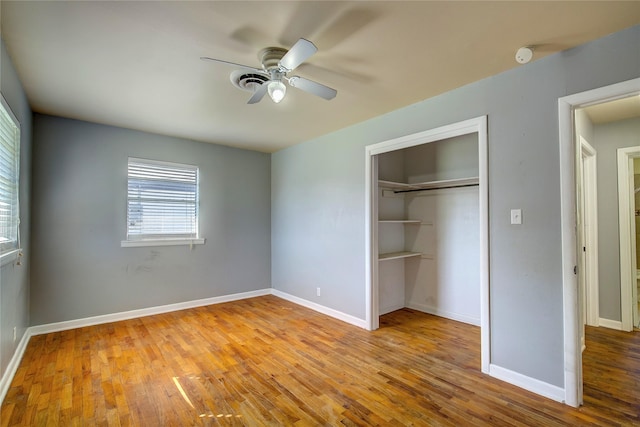 508 Ward St, Winnsboro, TX 75494 - unfurnished bedroom with a closet, wood finished floors, and baseboards
