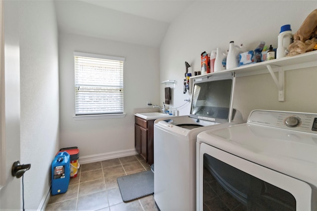 1424 Millican Ln, Aubrey, TX 76227 - laundry area featuring cabinet space, independent washer and dryer, light tile patterned floors, and baseboards