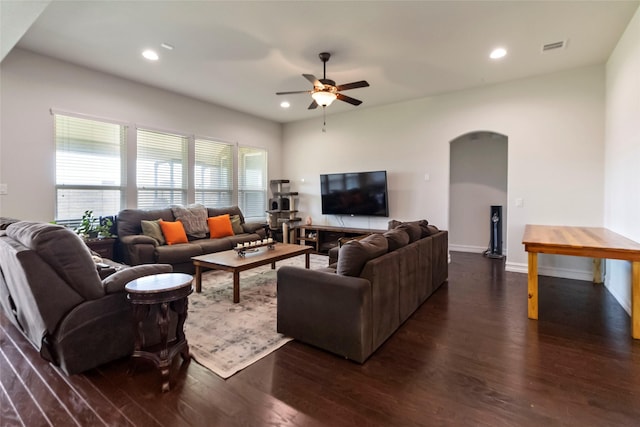 1424 Millican Ln, Aubrey, TX 76227 - living room featuring arched walkways, dark wood-type flooring, a ceiling fan, recessed lighting, and baseboards