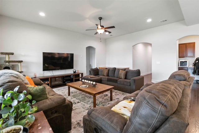 1424 Millican Ln, Aubrey, TX 76227 - living room with arched walkways, wood finished floors, a ceiling fan, recessed lighting, and baseboards