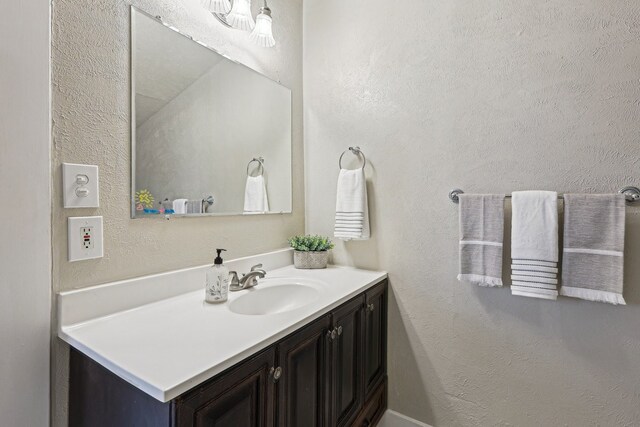 4617 El Campo Ave, Fort Worth, TX 76107 - bathroom featuring vanity and a textured wall