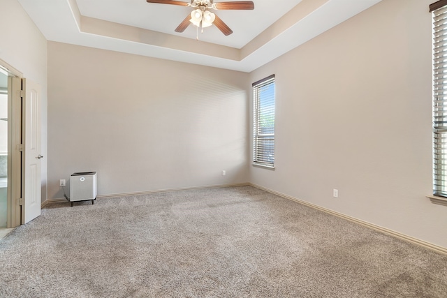 3113 Sangria Ln, Fort Worth, TX 76177 - unfurnished room with ceiling fan, a raised ceiling, and carpet flooring