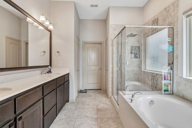 3113 Sangria Ln, Fort Worth, TX 76177 - bathroom with a bath, double vanity, a shower stall, and tile patterned floors