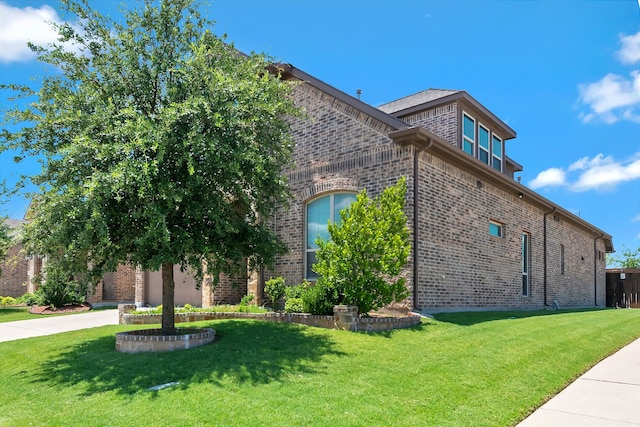 3113 Sangria Ln, Fort Worth, TX 76177 - view of property exterior featuring brick siding and a lawn