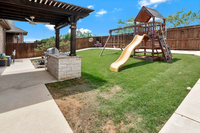 3113 Sangria Ln, Fort Worth, TX 76177 - fenced backyard featuring a playground and an outdoor kitchen