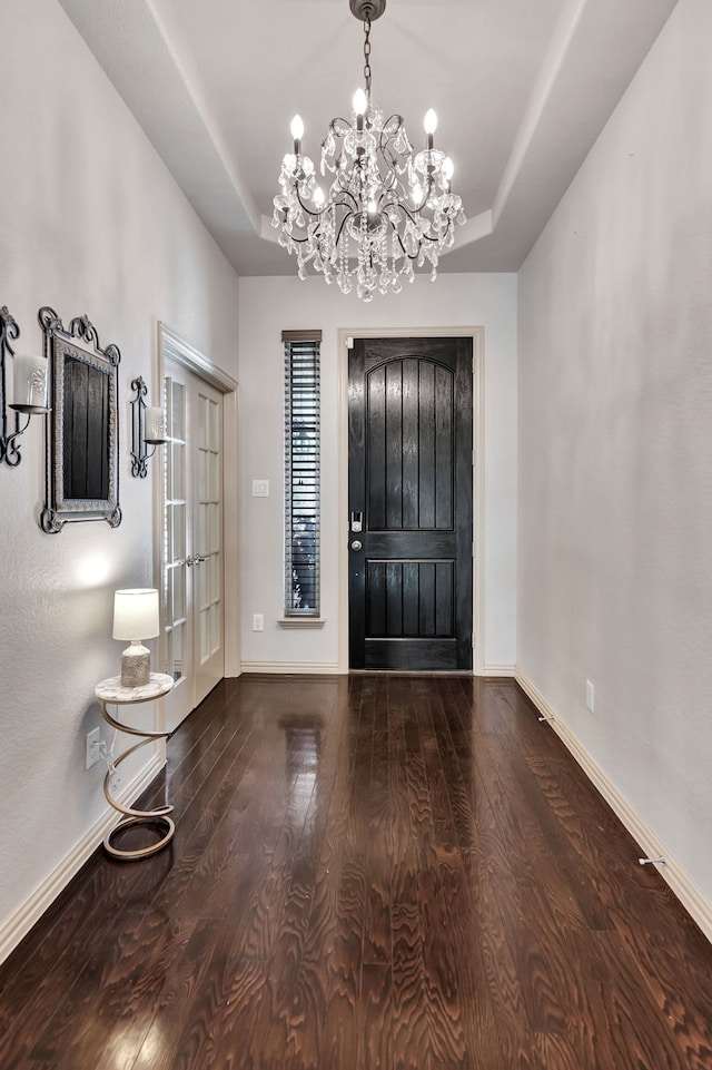 3113 Sangria Ln, Fort Worth, TX 76177 - entryway with a chandelier, wood finished floors, and a tray ceiling