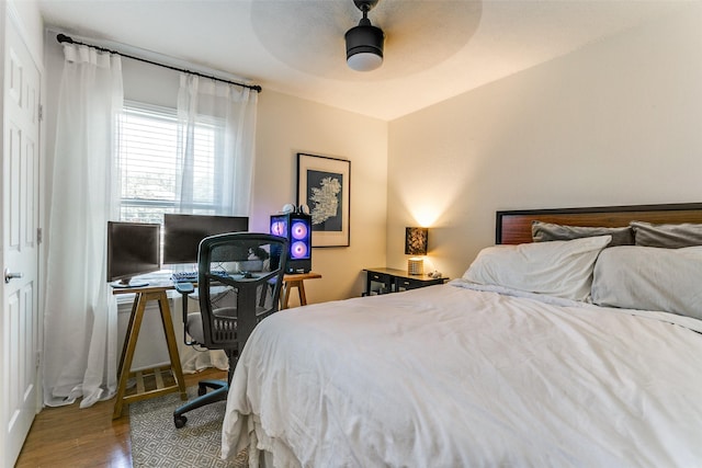 4223 Wild Plum Dr, Carrollton, TX 75010 - bedroom featuring wood finished floors, ceiling fan, and an office area
