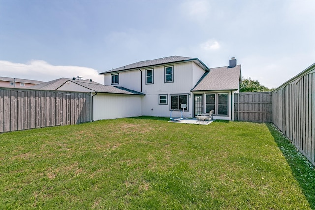 4223 Wild Plum Dr, Carrollton, TX 75010 - rear view of house featuring a chimney and a patio
