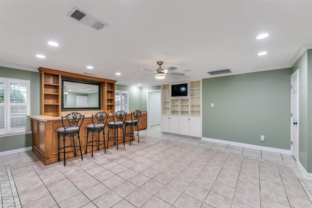 13914 Overlook Ln, Forney, TX 75126 - kitchen with open shelves, crown molding, baseboards, recessed lighting, and light tile patterned floors