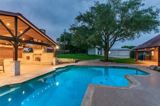 13914 Overlook Ln, Forney, TX 75126 - outdoor pool with exterior fireplace, a gazebo, and a patio area