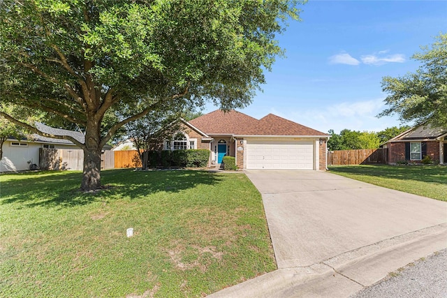 5608 Aberdeen Ct, Temple, TX 76502 - view of front of property with an attached garage, concrete driveway, and brick siding