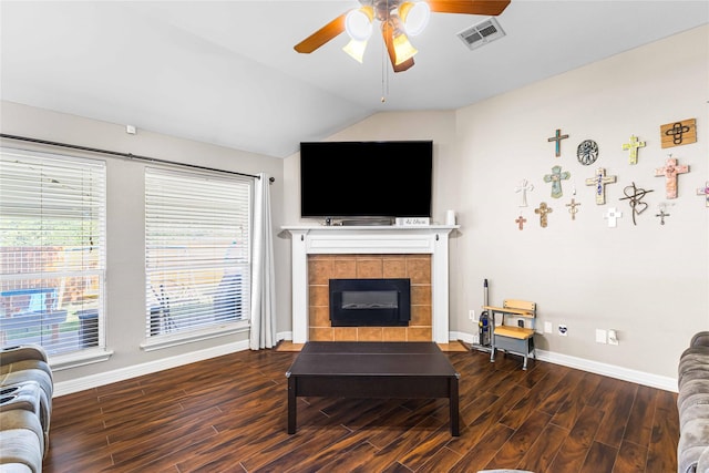 5608 Aberdeen Ct, Temple, TX 76502 - living room featuring baseboards, a ceiling fan, wood finished floors, a tile fireplace, and vaulted ceiling