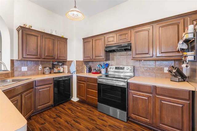 5608 Aberdeen Ct, Temple, TX 76502 - kitchen with stainless steel electric range, under cabinet range hood, a sink, and light countertops