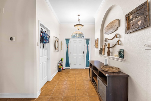 5608 Aberdeen Ct, Temple, TX 76502 - foyer entrance featuring crown molding, light tile patterned flooring, and baseboards