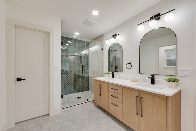 3605 Jomar Dr, Plano, TX 75075 - bathroom with double vanity, a stall shower, and recessed lighting