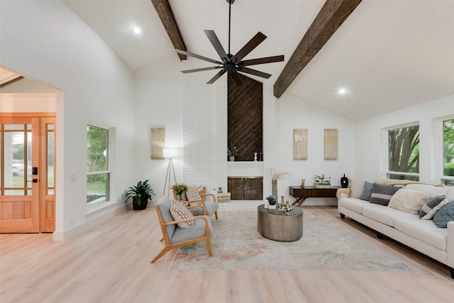 3605 Jomar Dr, Plano, TX 75075 - living area featuring beamed ceiling, wood finished floors, high vaulted ceiling, a fireplace, and recessed lighting