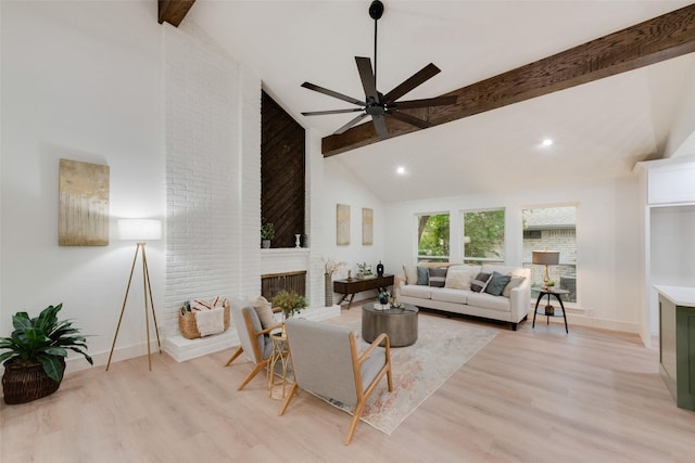 3605 Jomar Dr, Plano, TX 75075 - living room with beam ceiling, baseboards, a fireplace, light wood finished floors, and ceiling fan